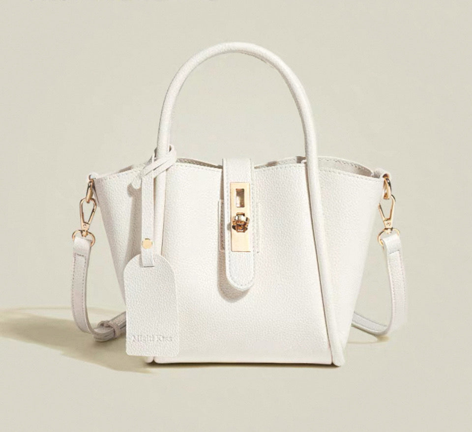 Women’s crop top cardigan with high waisted trousers & handbag outfit