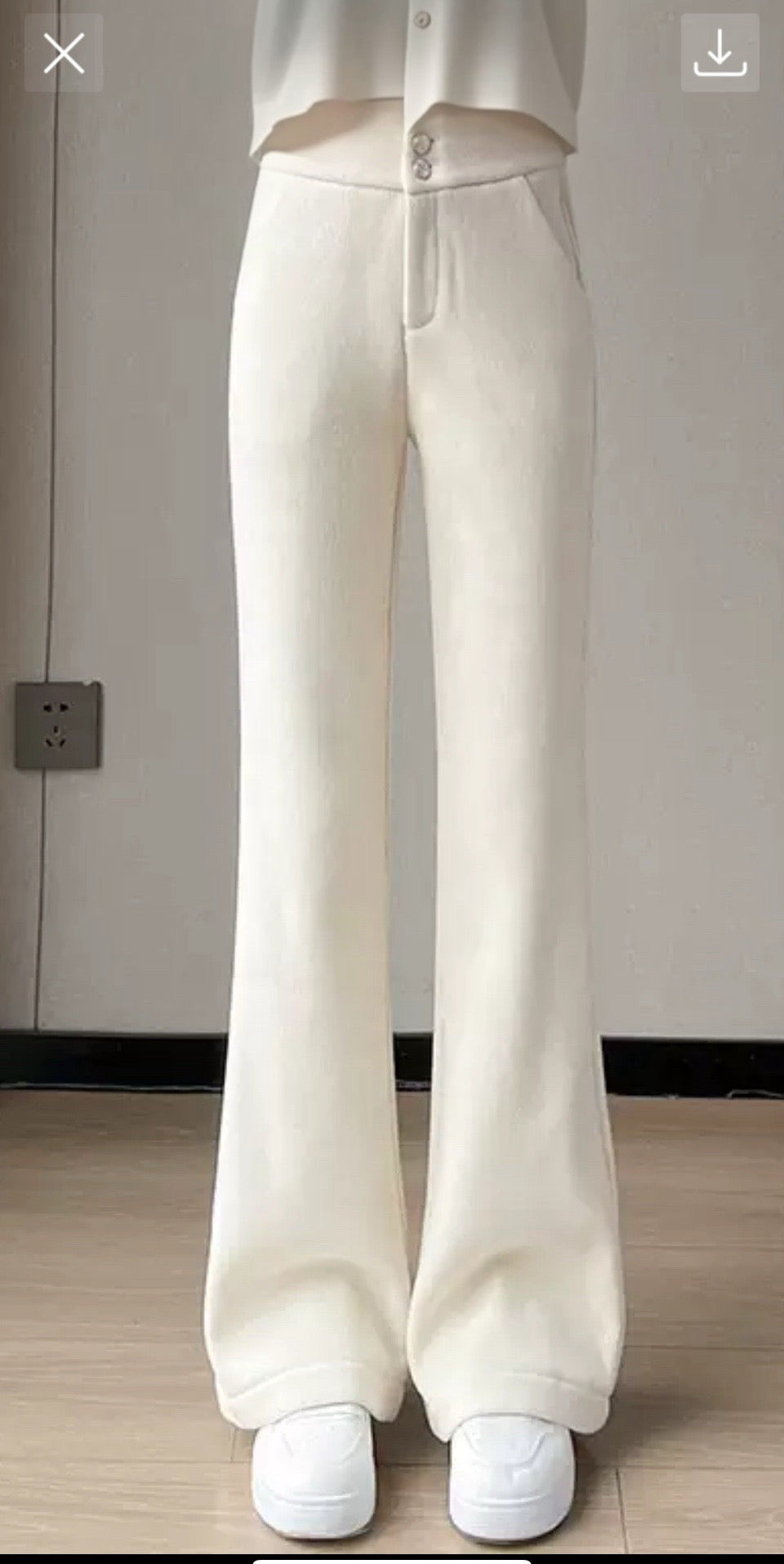 Women’s crop top cardigan with high waisted trousers & handbag outfit