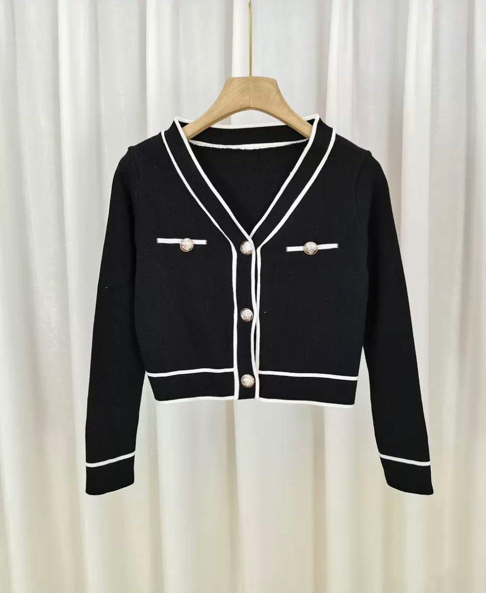 Women’s crop top cardigan with high waisted trousers & handbag outfit